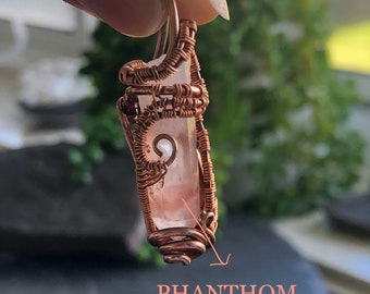 Phanthom Hematite Quartz wire wrapped pendant in copper with key and imprint formations.