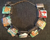 Rare exquisite vintage 1940s Toshikane sterling silver and porcelain link bracelet featuring 7 Japanese scenes