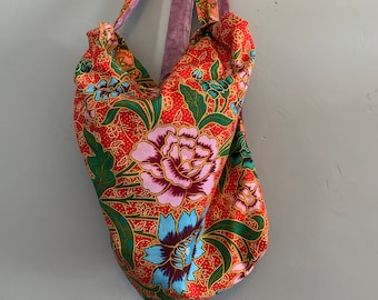 Handmade fabric backpack converts easily to a shoulder bag tote