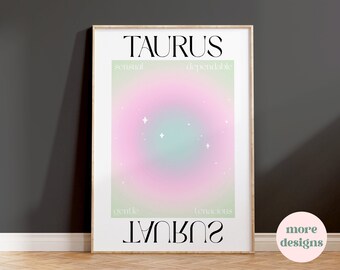 May include: A framed poster with the word "TAURUS" at the top. The poster features a soft gradient of pink and green with the words "sensual", "dependable", "gentle", and "tenacious". The word "TAURUS" is also written upside down at the bottom.