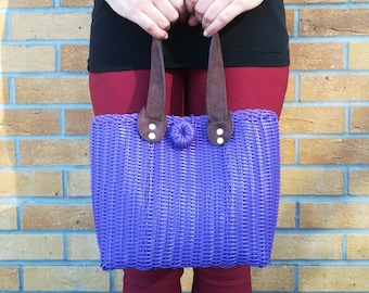 Originally designed handwoven recycled plastic tote bag with suede handles