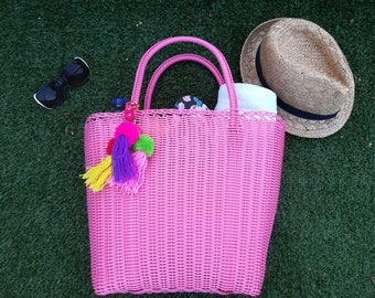 Large pink tote bag, handwoven from recycled plastic, strong and durable, perfect as a shopper bag or beach bag