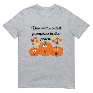 Ich lehre die niedlichsten Kürbisse in dem Patch Kurzarm Unisex T-Shirt