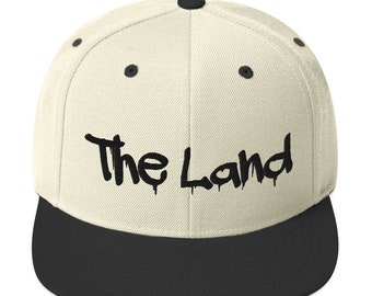 La gorra snapback de la tierra