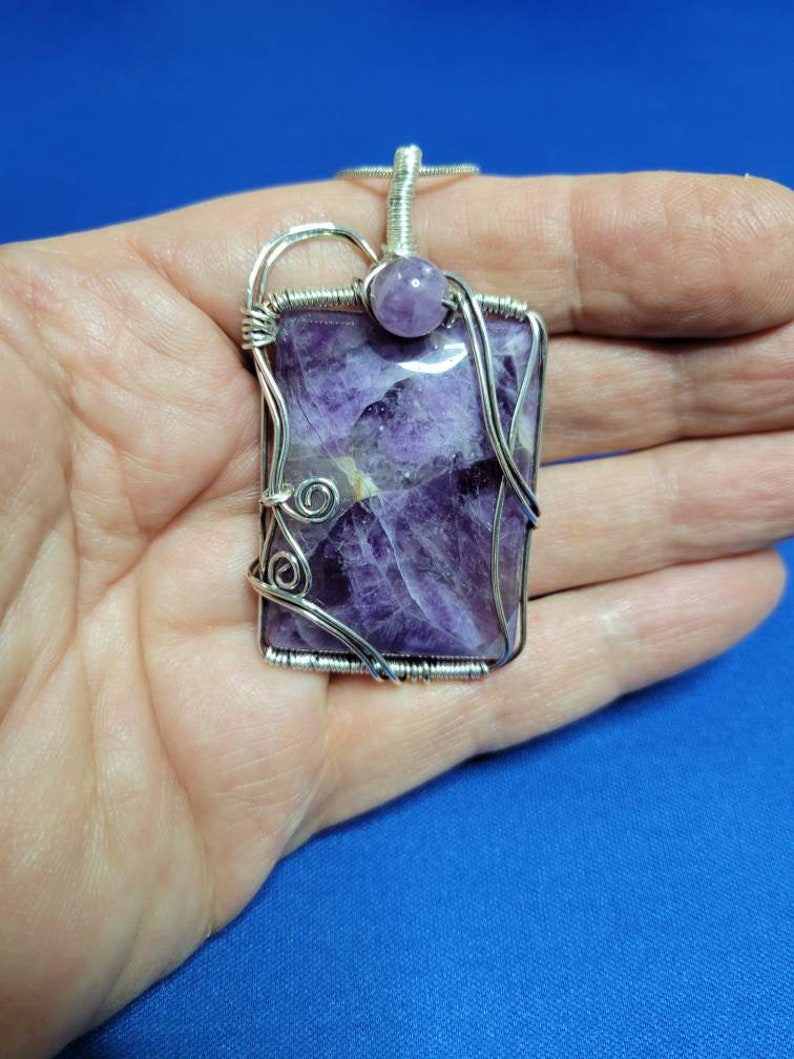 Beautiful amethyst stone wire wrapped in silver oxidized wire.