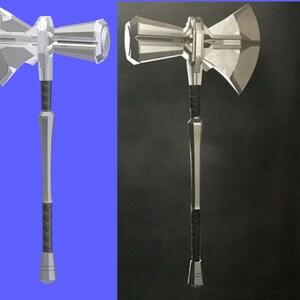 May include: A silver and black prop hammer with a double-bladed axe head. The handle is wrapped in black material. The hammer is a replica of a fictional weapon.