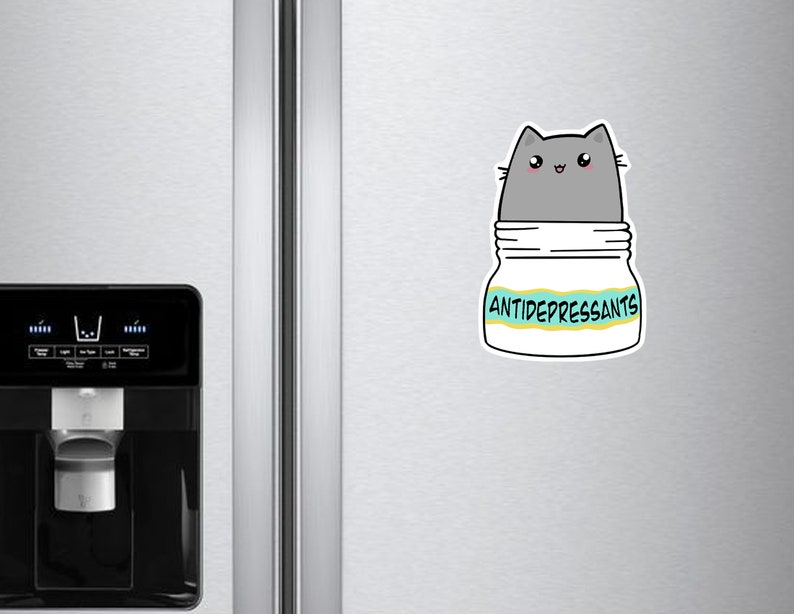 May include: A gray cat cartoon illustration inside a white jar with the text "ANTIDEPRESSANTS" on a blue and yellow label.