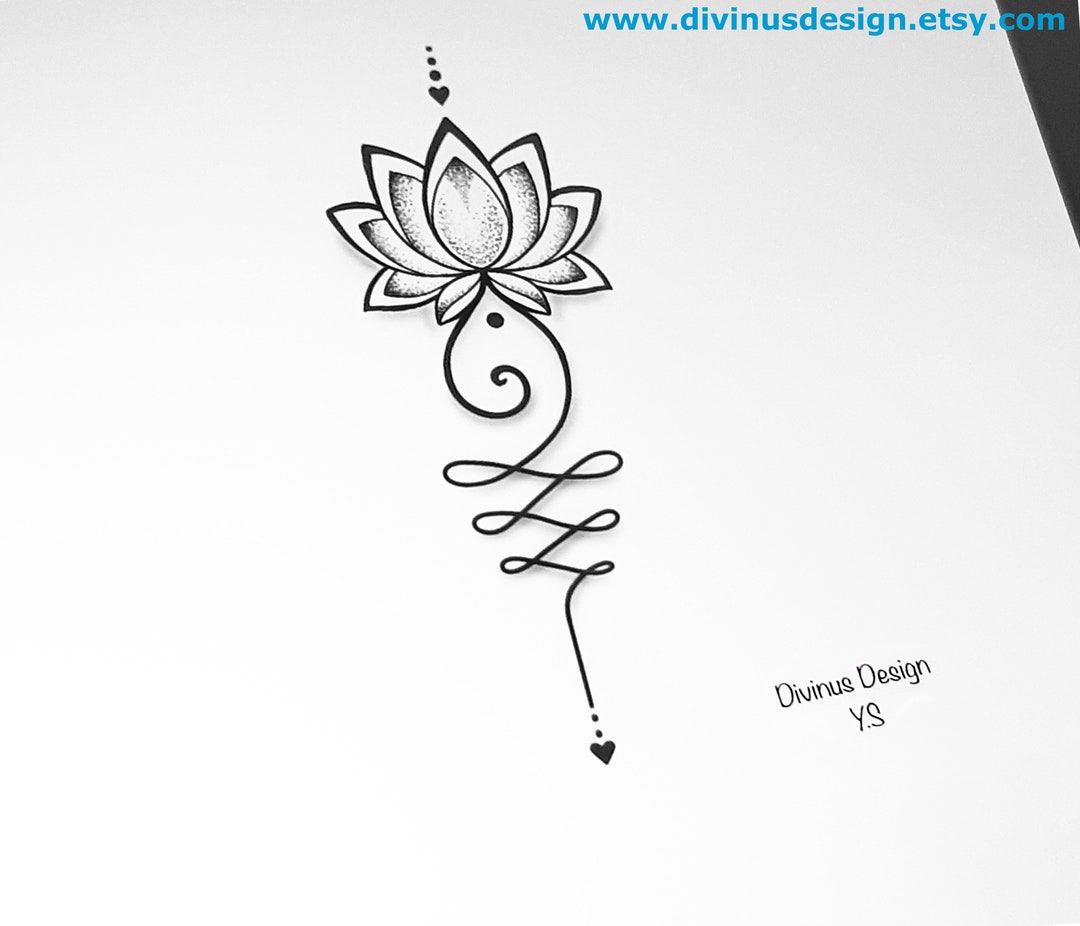 Fine line lotus flower tattoo on the right inner arm.