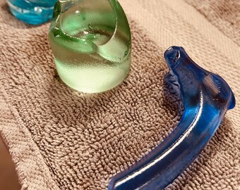 Sea glass, ornate shapes and sizes, knob hardware for your home decor. Handmade and sea water tumbled to a smooth edge. Then colored.