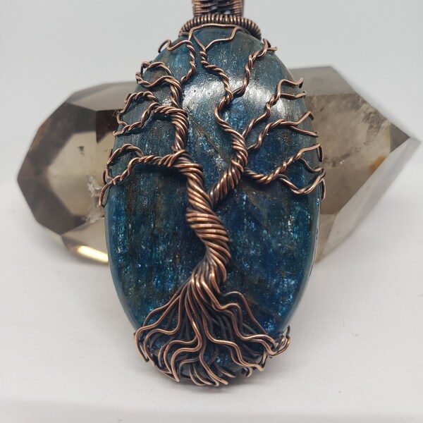 Copper Tree on Sparkly blue Apatite oval