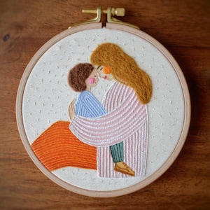 水彩画に描かれた母と子の刺繍、母への贈り物