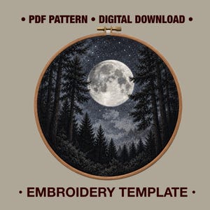 May include: A circular wooden embroidery hoop containing a fabric piece with a detailed night scene featuring a large full moon, a starry sky, and a dense forest of pine trees. The text PDF PATTERN DIGITAL DOWNLOAD EMBROIDERY TEMPLATE is visible.