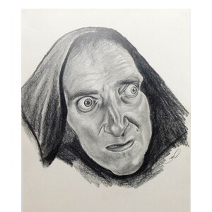 May include: A pencil sketch of a man's face, featuring a prominent nose, wide eyes, and a furrowed brow. The man is wearing a dark hood, and the drawing is done in shades of gray, creating a dramatic effect. The artwork is signed in the lower right corner.