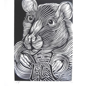 May include: Black and white woodblock print of a rat with the Chinese character for "rat" in the lower right corner.