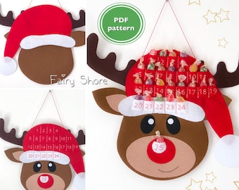 May include: A felt reindeer Christmas advent calendar with 25 numbered pockets for treats. The reindeer has a red Santa hat with a white pom-pom. The calendar is hanging from a red string.