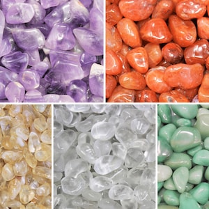 May include: Assortment of tumbled stones in various colors, including amethyst, carnelian, citrine, clear quartz, and green aventurine. The stones are smooth and polished, perfect for use in crafts, jewelry making, or meditation.
