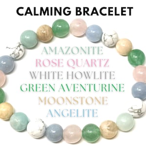 May include: A calming bracelet made with various gemstones, including amazonite, rose quartz, white howlite, green aventurine, moonstone, and angelite.