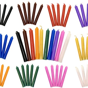 May include: Assortment of 100 small taper candles in various colors, including black, brown, red, orange, yellow, green, blue, purple, white, and pink.