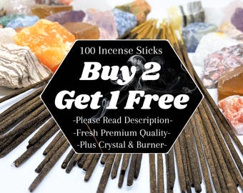 May include: A collection of brown incense sticks arranged around a central black hexagonal sign with white text reading 100 Incense Sticks Buy 2 Get 1 Free -Please Read Description- -Fresh Premium Quality- -Plus Crystal & Burner- surrounded by raw crystals.