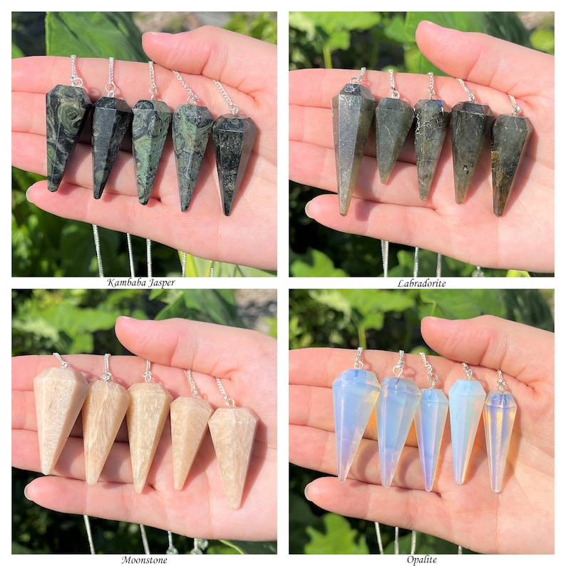May include: Four sets of five crystal pendulums, each set featuring a different type of crystal: Kambaba Jasper, Labradorite, Moonstone, and Opalite. The pendulums are all silver-toned and have a pointed tip.