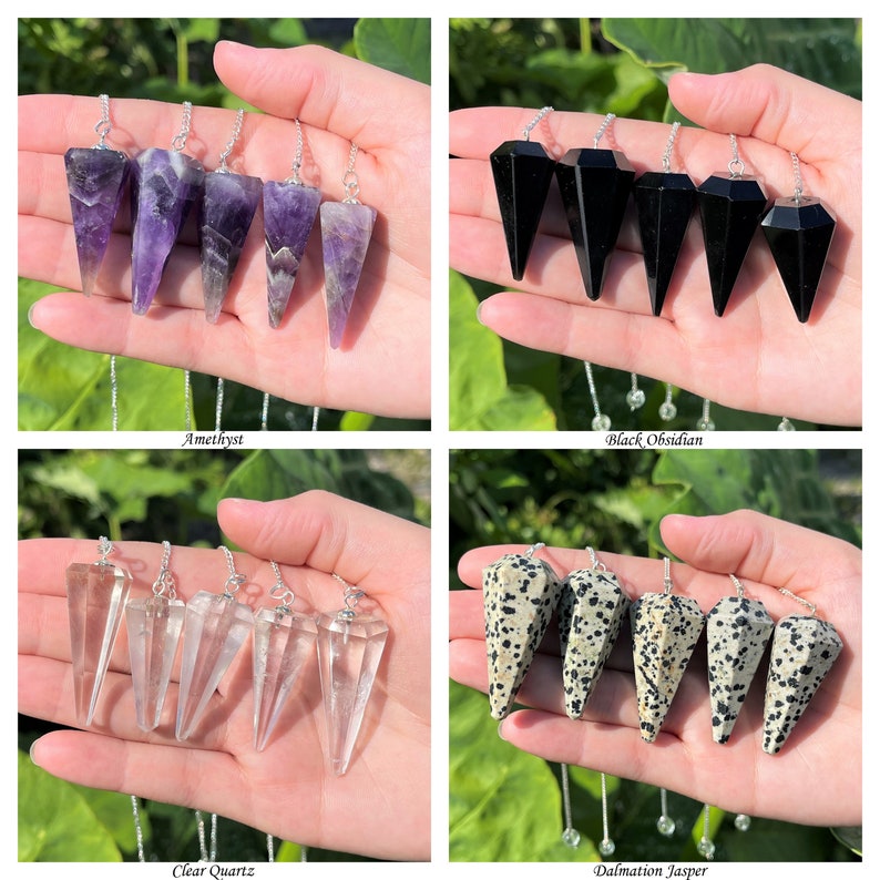 May include: Four sets of five crystal pendulums, each set featuring a different type of crystal: amethyst, black obsidian, clear quartz, and dalmatian jasper. The pendulums are held in a hand, with the chains hanging down.
