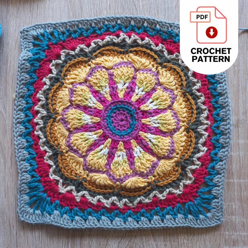 Gazania Daisy inspired granny square, colorful crochet pattern with a floral design. The pattern features a central abstract flower in shades of yellow, pink, and blue, surrounded by concentric rings of various colors. The text "CROCHET PATTERN" is in the upper right corner.