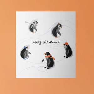 Weihnachtskarte Schlittschuhlaufende Pinguine