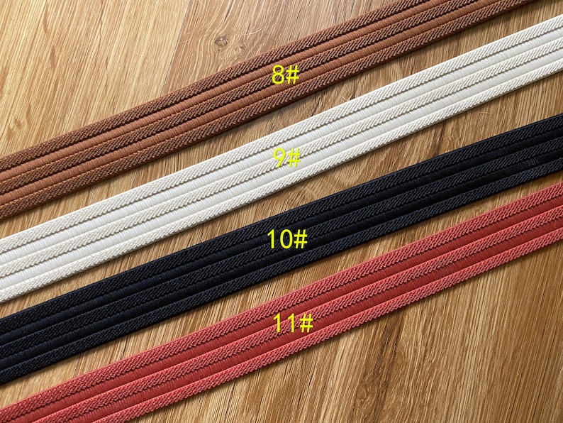 May include: Four different types of elastic trim with three rows of stitching. The trim is labeled 8#, 9#, 10#, and 11#.