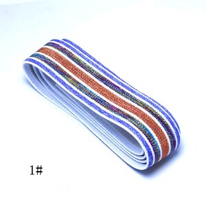 May include: White elastic band with blue and orange stripes with a shimmery finish. The elastic band is folded in half and the text "1#" is visible in the lower left corner of the image.