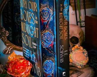 Libro firmado de Bury Our Bones: Bordes pintados a mano, Edición de coleccionista de V.E. Schwab