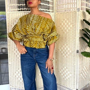 yellow striped off the shoulder top