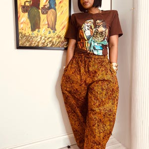 Pantalones de pierna ancha Ankara con rayas naranja quemado y negras, 100 % algodón estampado, bolsillos (tobillos o largos), talla única (Reino Unido 8-14).