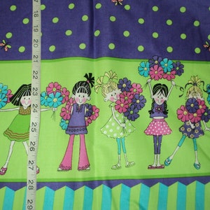 May include: Purple fabric with green polka dots and a row of girls holding bouquets of flowers. The girls are wearing colorful dresses and have black hair. The fabric has a green and blue striped border.