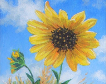 Prairie sunflower painting, lit up by the sun against a bright blue sky with wind blown clouds.