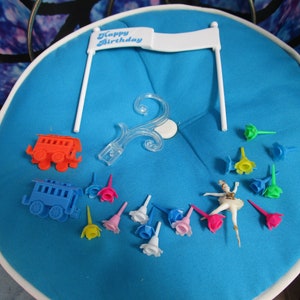 Vintage Bag of Birthday Decoration Items Candle Holders, Happy Birthday Banner, Small Trains