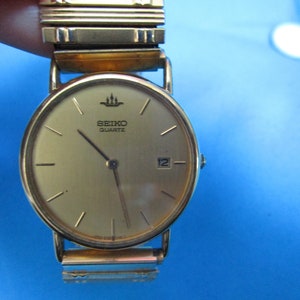 Vintage Mens Seiko Quartz Wrist Watch Base Metal St Steel Back Japan 291454