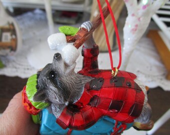 Vintage Raccoon Laying on Sleeping Bag Eating Marshmallows on a stick Christmas Ornament