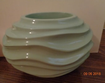 Lovely vintage soft green vase with waves in pottery