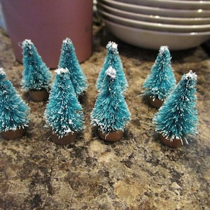 Vintage set of 8 miniature bottlebrush Christmas Trees Green with White Snow and Wooden Base