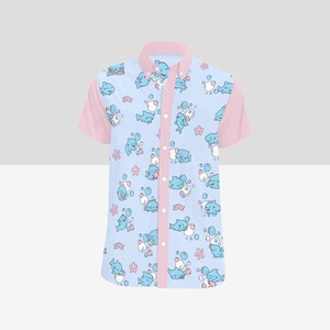 May include: A light blue short-sleeved button-down shirt with a pink collar and a pattern of blue cartoon sharks and pink bubbles.