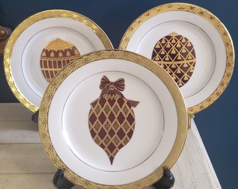 Three Celebrity by Muirfield Salad Plates with Ornament Egg Decoration and Gold Band Of Flowers