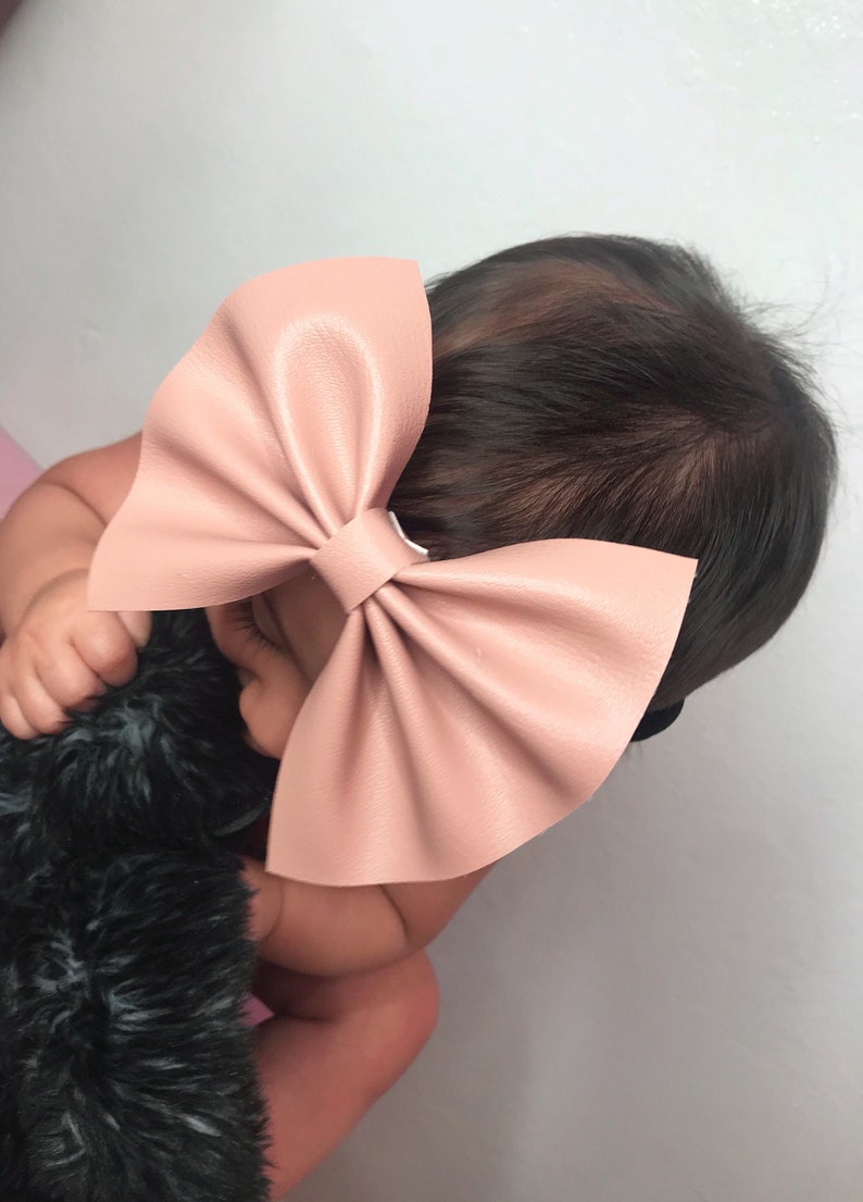 Pink Mauve Fake Leather Bow On Stretchy Headband For Babies Toddlers And Adults