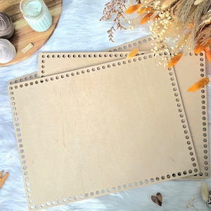 May include: A rustic wooden sign with the text "Welcome to our home" in white lettering. The sign has a distressed finish and a simple, inviting design, ideal for entryway decor.