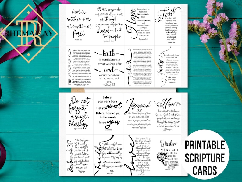 May include: Printable scripture cards with black text on a white background. The cards feature various bible verses and quotes about faith, hope, love, wisdom, trust, and family. The cards are arranged in a grid pattern on a wooden surface.