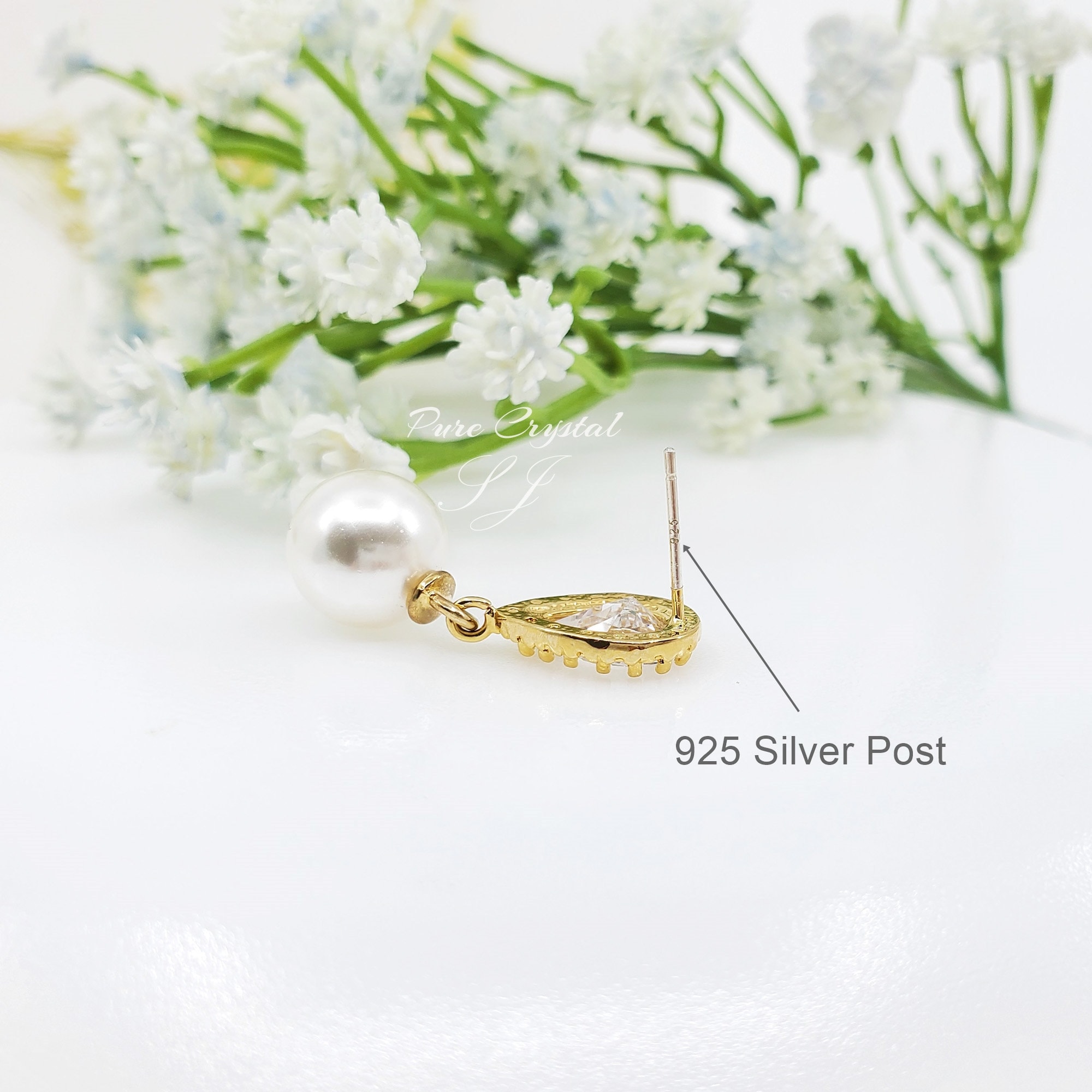 Orecchini cubici in zirconia pera a goccia in oro giallo 9ct
