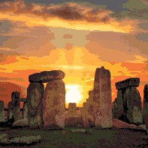 May include: A pixelated image of Stonehenge at sunset. The ancient stone structure is silhouetted against a vibrant sky of orange, yellow, and red hues. The sun is positioned behind the stones, creating a dramatic and historical scene.