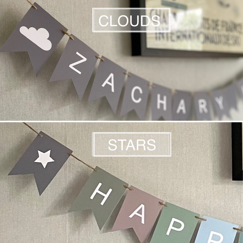 Op de afbeelding: Twee grijze en witte vlaggenlijnen met de woorden "CLOUDS" en "ZACHARY" op de ene lijn en "STARS" en "HAPPY" op de andere.