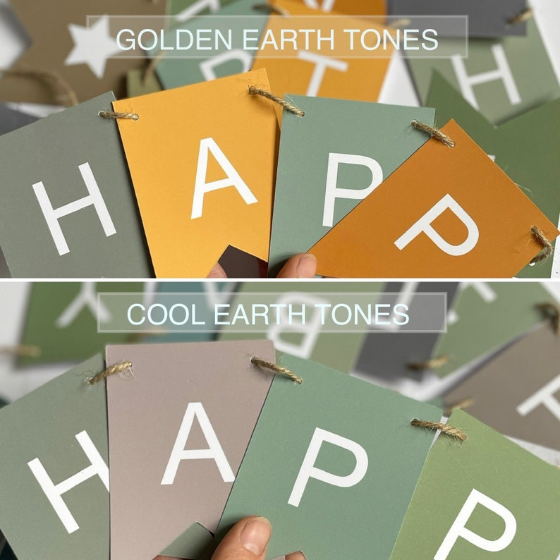 Op de afbeelding: Een banner met het woord "HAPPY" gespeld in witte letters op groen en bruin karton. De banner is versierd met een ster en de woorden "Golden Earth Tones" en "Cool Earth Tones".