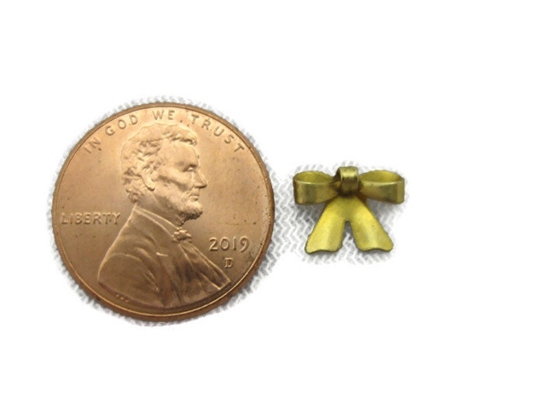 2 pieces Made in the USA Antiqued Brass Vintage Design Flat Back Small Bow Stamping