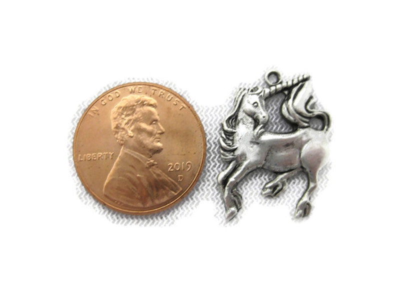 2 pieces Antiqued Brass Vintage Design Unicorn Charm with Ring Made in the USA